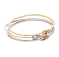 Coach three tone bracelet