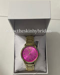 Steve Madden women’s signature Gold Tone Alloy Metal Bracelet watch with fuchsia dial, 36mm