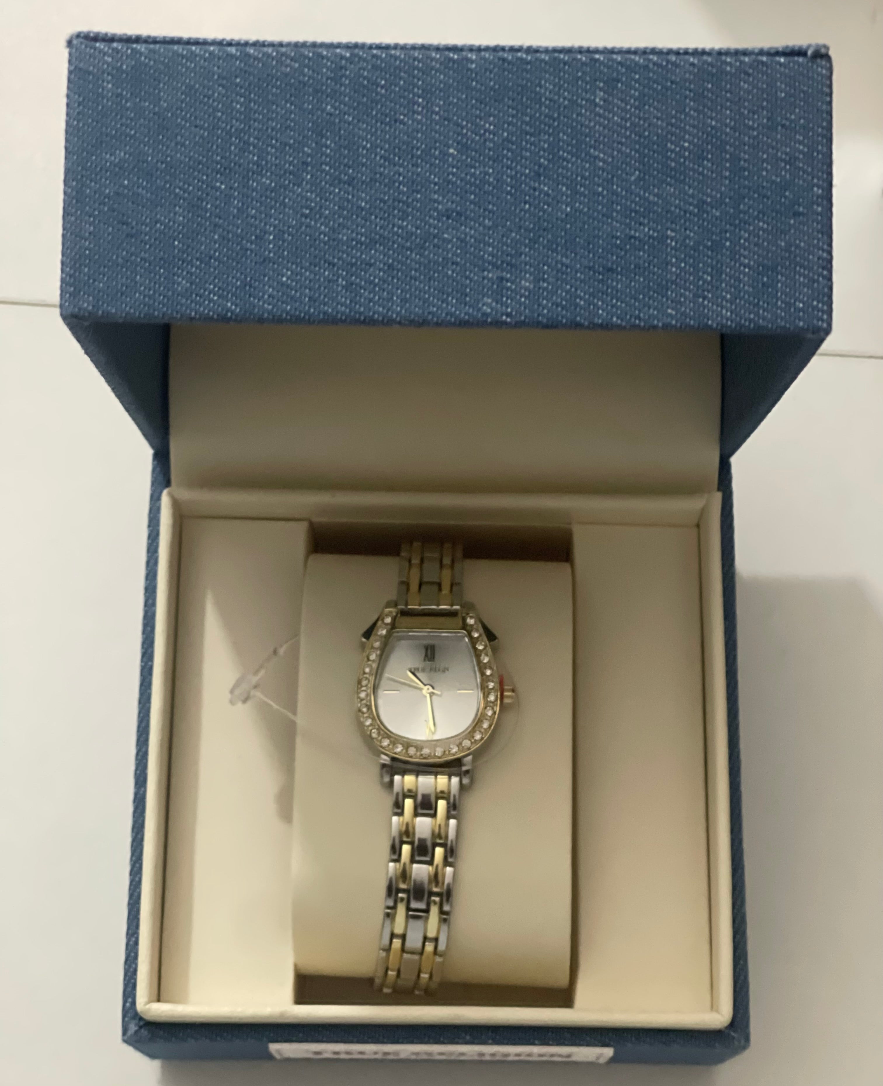 True Religion women’s two tone bracelet watch