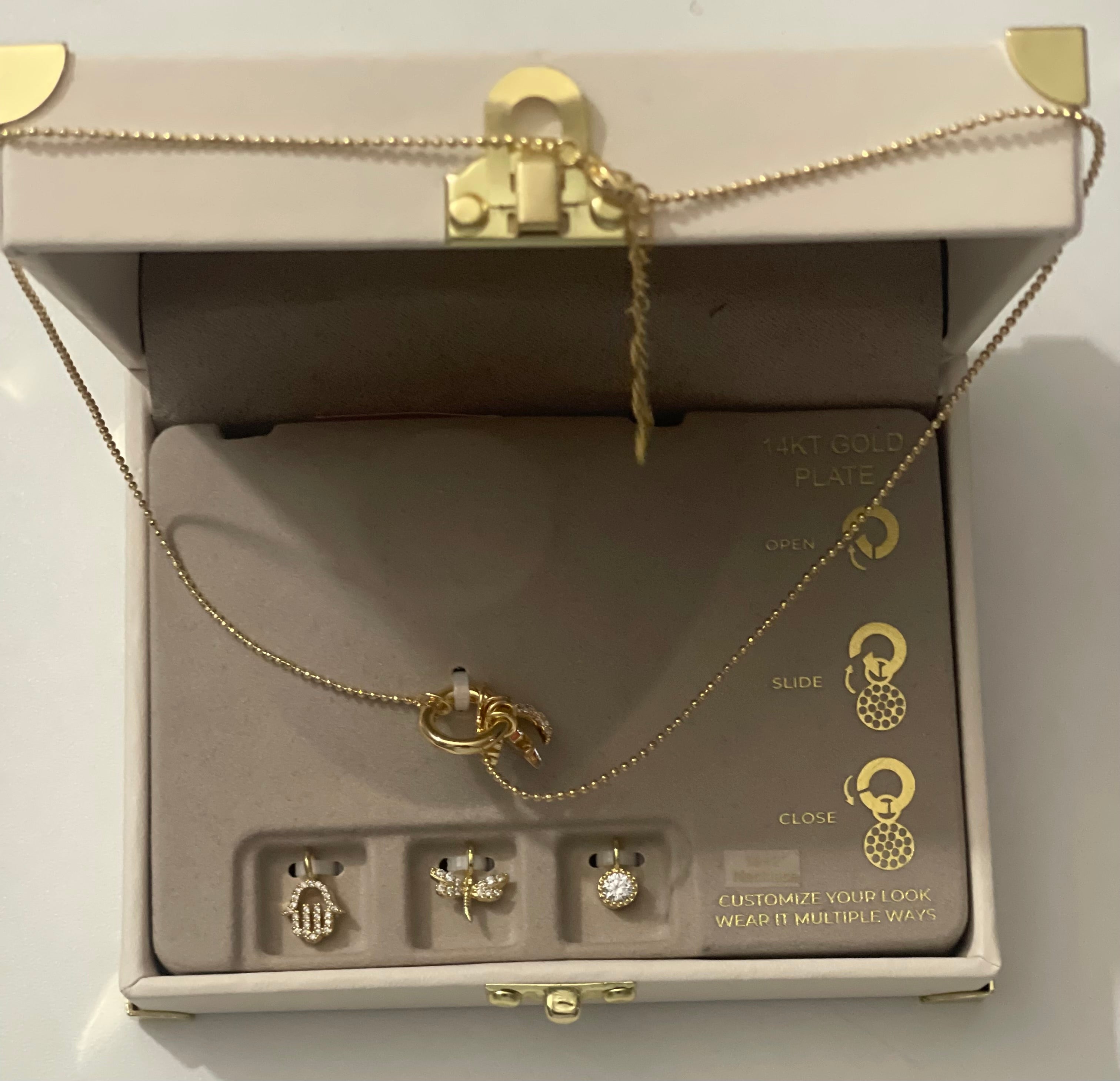 Charm Bar 14kt gold plated necklace with three extra pendants in a nude treasure box