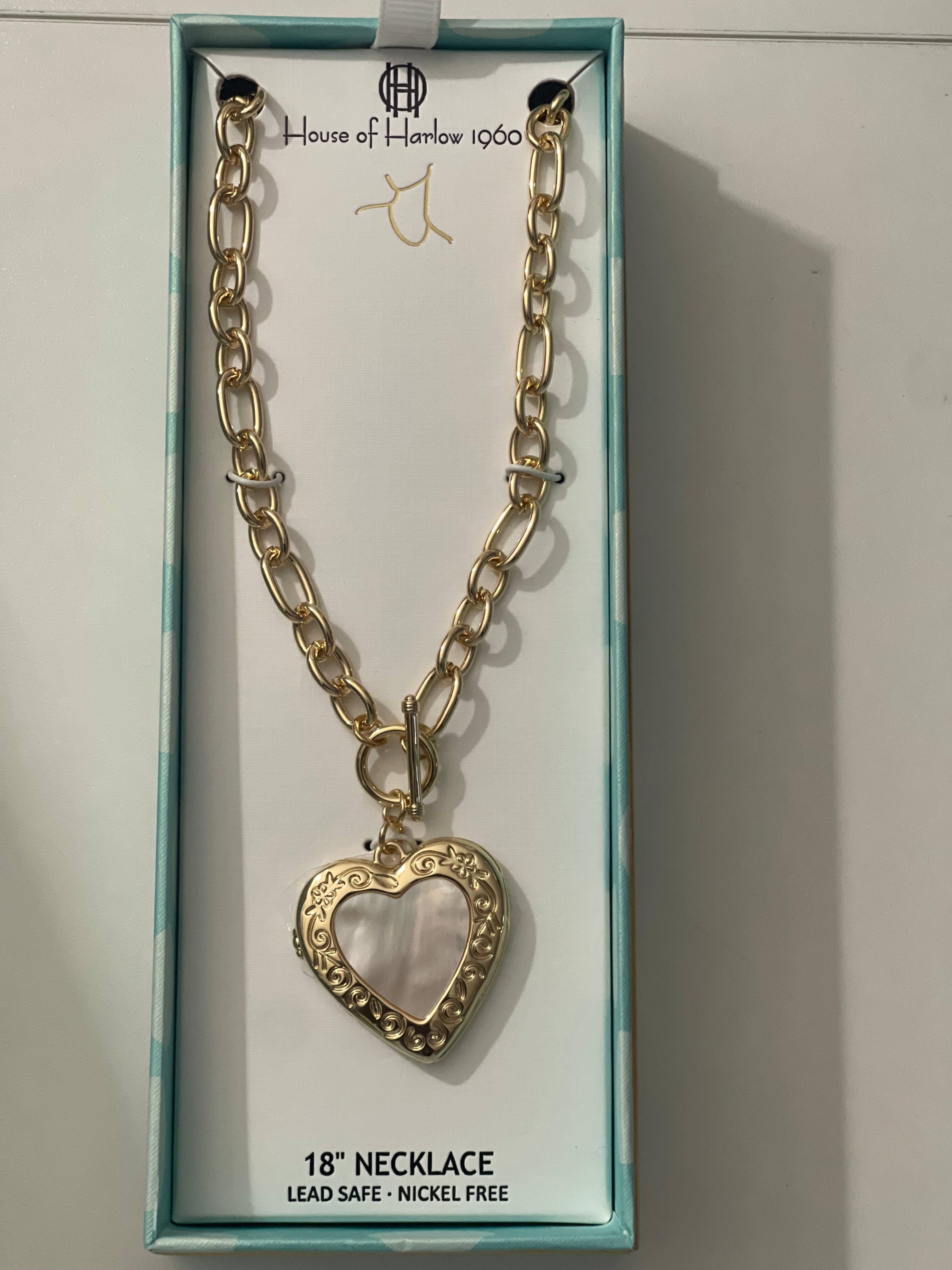 House of Harlow gold necklace with love open picture pendant